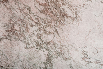 Marble slab with green and red streaks