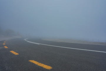 Fototapeta na wymiar Foggy mountain road