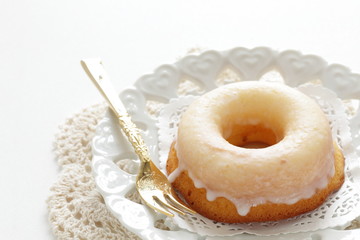 Icing donut on dish for afternoon tea image