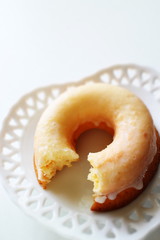 Icing donut on dish for afternoon tea image