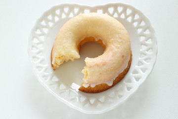 Icing donut on dish for afternoon tea image