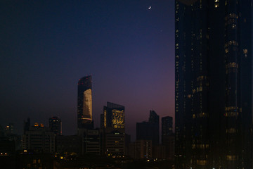 Fototapeta na wymiar Beautiful view of World trade center in Abu Dhabi city immediately after sunset