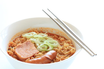 Korean style ramen noodles, luncheon meat and sausage with scallion