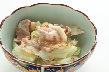 japanese food, boiled pork belly on cabbage with sesame sauce