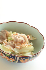japanese food, boiled pork belly on cabbage with sesame sauce