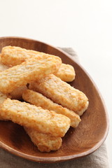 Frozen food, hash brown on wooden plate
