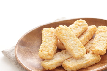 Frozen food, hash brown on wooden plate