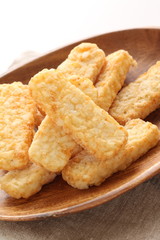 Frozen food, hash brown on wooden plate