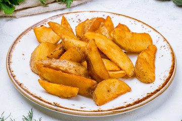 The potatoes wedges on the Board