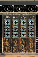 Zumiao Ancestor's Temple is a Daoist temple in Foshan, Guangdong, China.. The temple was listed as one of the main cultural relics. Typical Lingnan style wooden ornamented door.       