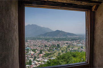 Fototapeta na wymiar Srinagar city view with lake and mountain, Jammu and Kashmir state, India