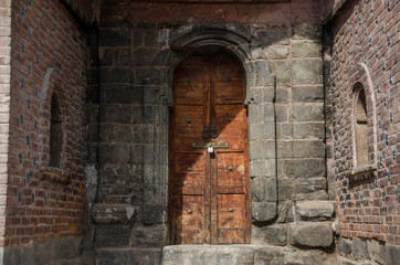 Fototapeta na wymiar Detail Graves surround the Tomb of Budshah, a popular tourist attraction in Srinagar, Kashmir, India.