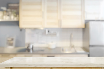 White marble countertops with modern kitchen room background.