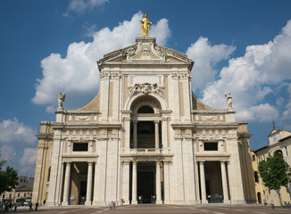 Fototapeta na wymiar Assisi,Italy-July 28, 2018: The Basilica of Santa Maria degli Angeli