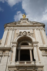 Fototapeta na wymiar Assisi,Italy-July 28, 2018: The Basilica of Santa Maria degli Angeli