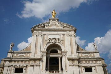 Fototapeta na wymiar Assisi,Italy-July 28, 2018: The Basilica of Santa Maria degli Angeli 