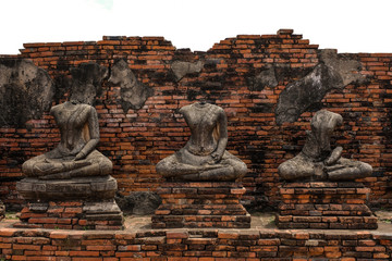 Fototapeta na wymiar Three ruined buddha statue in Ayutthaya Kingdom Thailand or Wat Chai Wattanaram