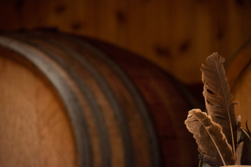 Wine barrel with feathers