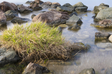 The beach with stones. Big stones on the beach. Morning inflow of water. Bulgaria, Burgas, Nessebar, Olympic Hope beach