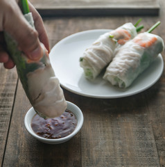 Fresh assorted Asian spring rolls set with shrimps, vegetables, fruits, copy space