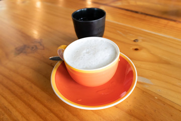 Fresh milk Mix Honey in Orange Ceramic Cup
