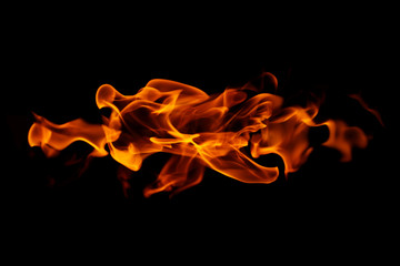 Fototapeta premium Fire flames on black background