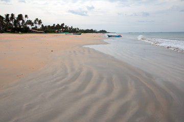 Swirling sand patterns on Nilaveli Beach in Trincomalee Sri Lanka Asia