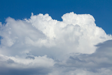 Naklejka na ściany i meble Cumulonimbus cloud blue sky