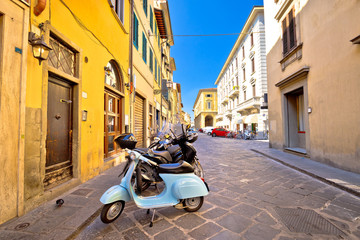 Fototapeta na wymiar Scooters in street of Florence view