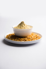 Besan, Gram or chickpea flour or powder is a pulse flour made from a variety of ground chickpea known as Bengal gram. popular ingredient for Pakora/pakoda or bajji snack. Selective focus