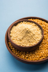 Besan, Gram or chickpea flour or powder is a pulse flour made from a variety of ground chickpea known as Bengal gram. popular ingredient for Pakora/pakoda or bajji snack. Selective focus