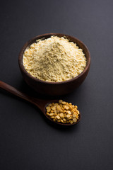 Besan, Gram or chickpea flour or powder is a pulse flour made from a variety of ground chickpea known as Bengal gram. popular ingredient for Pakora/pakoda or bajji snack. Selective focus