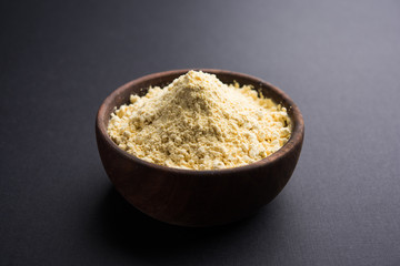 Besan, Gram or chickpea flour or powder is a pulse flour made from a variety of ground chickpea known as Bengal gram. popular ingredient for Pakora/pakoda or bajji snack. Selective focus