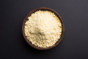 Besan, Gram or chickpea flour or powder is a pulse flour made from a variety of ground chickpea known as Bengal gram. popular ingredient for Pakora/pakoda or bajji snack. Selective focus