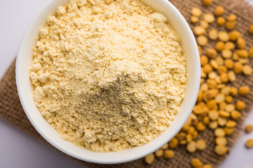 Besan, Gram or chickpea flour or powder is a pulse flour made from a variety of ground chickpea known as Bengal gram. popular ingredient for Pakora/pakoda or bajji snack. Selective focus