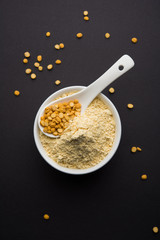 Besan, Gram or chickpea flour or powder is a pulse flour made from a variety of ground chickpea known as Bengal gram. popular ingredient for Pakora/pakoda or bajji snack. Selective focus