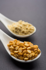 Besan, Gram or chickpea flour or powder is a pulse flour made from a variety of ground chickpea known as Bengal gram. popular ingredient for Pakora/pakoda or bajji snack. Selective focus