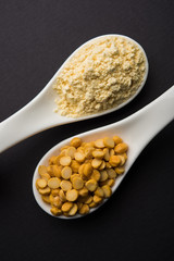 Besan, Gram or chickpea flour or powder is a pulse flour made from a variety of ground chickpea known as Bengal gram. popular ingredient for Pakora/pakoda or bajji snack. Selective focus