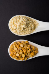 Besan, Gram or chickpea flour or powder is a pulse flour made from a variety of ground chickpea known as Bengal gram. popular ingredient for Pakora/pakoda or bajji snack. Selective focus