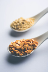 Besan, Gram or chickpea flour or powder is a pulse flour made from a variety of ground chickpea known as Bengal gram. popular ingredient for Pakora/pakoda or bajji snack. Selective focus