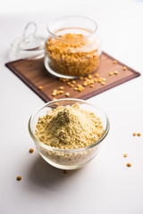 Besan, Gram or chickpea flour or powder is a pulse flour made from a variety of ground chickpea known as Bengal gram. popular ingredient for Pakora/pakoda or bajji snack. Selective focus