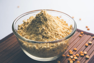 Besan, Gram or chickpea flour or powder is a pulse flour made from a variety of ground chickpea known as Bengal gram. popular ingredient for Pakora/pakoda or bajji snack. Selective focus