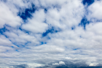 Clouds on a blue sky as a background