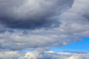 Clouds on a blue sky as a background
