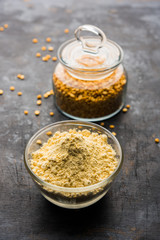 Besan, Gram or chickpea flour or powder is a pulse flour made from a variety of ground chickpea known as Bengal gram. popular ingredient for Pakora/pakoda or bajji snack. Selective focus