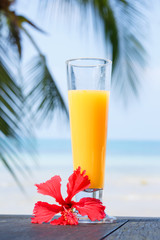 glass of juice with a view of the sea.