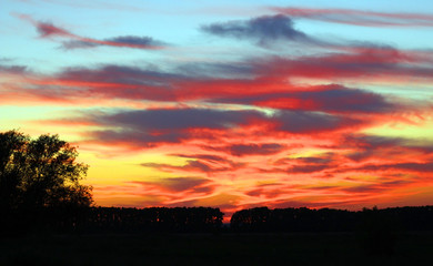 Fiery orange sunset sky Beautiful sky.