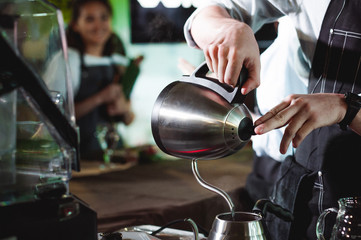 championship among coffee houses, members of teams show barista's skill, prepare drinks, teamwork....