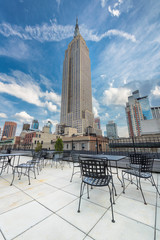 Rooftop cafe overlooking the Empire state building, Manhattan, New York City. 