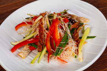 Asian salad with salmon skin